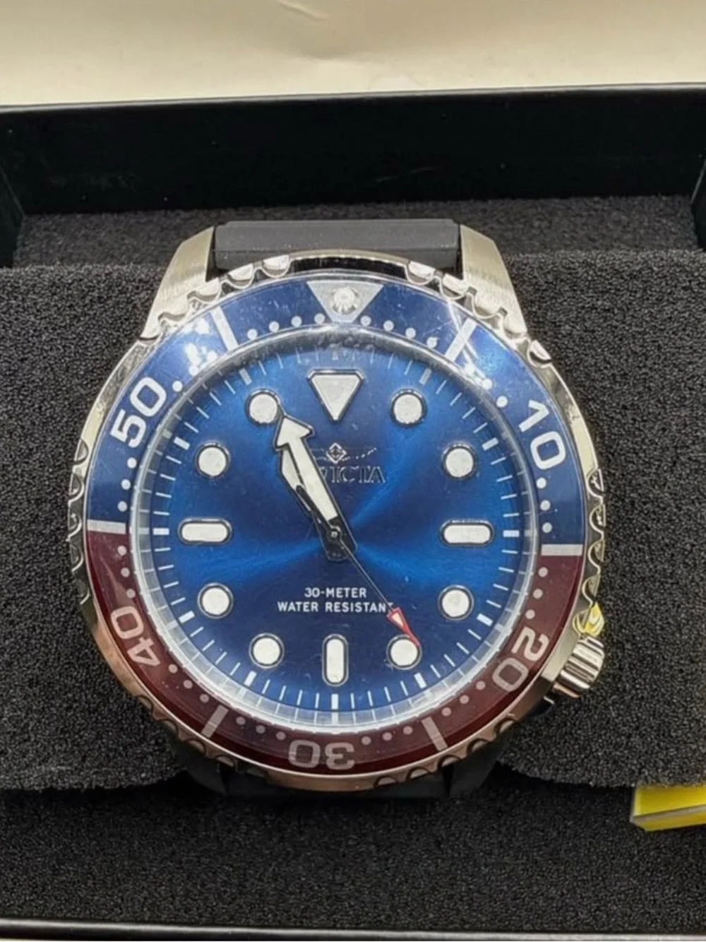 Invicta Men’s Blue Dial Watch with Blue and Red Bezel